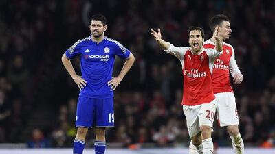 Chelsea's Diego Costa, left, and Arsenal's Mathieu Flamini during their match on Sunday night. Reuters / Dylan Martinez
