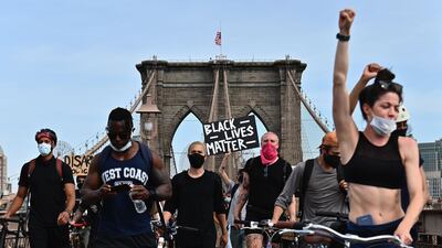 Protesters demonstrate on top of New York City's Brooklyn Bridge on June 4, 2020. AFP