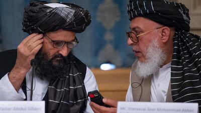 Sher Mohammad Abbas Stanikzai, the Taliban's chief negotiator (left), has said the 'door is open' to resuming peace talks with the US. AP