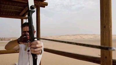 Andries Dreyer, an activities guide at Qasr Al Sarab, does his best to give hotel guests a good time.