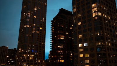 Viewed from the Upper West Side of Manhattan, the night sky is alight as a Con Edison facility in the Queens borough of New York experiences a transformer explosion. AP Photo