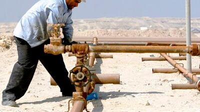 An employee of Bahrain Petroleum Company, the national oil company. The government is now clamping down on strike action. AP Photo / Hasan Jamali