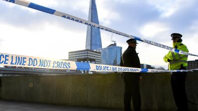 Police officers patrol London Bridge, where knife attacker Usman Khan was killed on Friday. AP