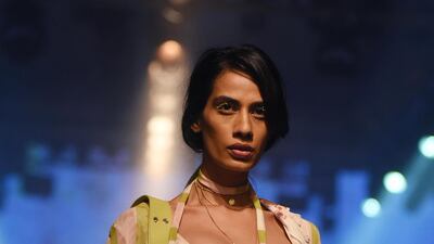Designer Arpita Mehta pairs her outfits with pastel-coloured purses. AFP