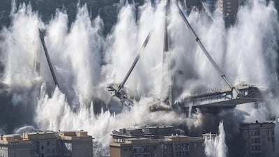 The demolition of the large towers '10' and '11' of the Morandi bridge using micro-explosive charges, in Genoa, northern Italy. EPA