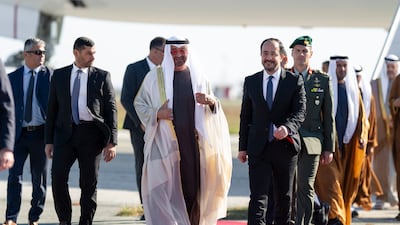 President Sheikh Mohamed, centre, with President of Cyprus Nikos Christodoulides, right, at Larnaca International Airport. UAE Presidential Court