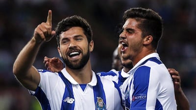 Porto's Felipe, left, celebrates with teammate Andre Silva after scoring in their Champions League match on Tuesday. Angelo Carconi / EPA