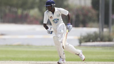 UAE captain Yodhin Punja took five wickets to help his side to a convincing win over Kuwait. Sarah Dea / The National
