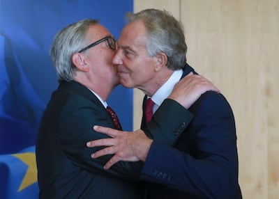 Former British Prime Minister Tony Blair met European Commission President Jean Claude Juncker for a meeting in Brussels. Olivier Hoslet/ EPA