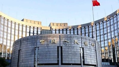 The headquarters of the People's Bank of China in Beijing. The bank has enough scope for monetary easing should conditions deteriorate. Xinhua via AP Photo