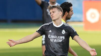 Martin Odegaard in a rare appearance for Real Madrid last November. Reuters