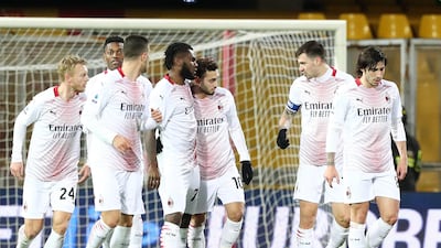 Franck Kessie, centre, celebrates with team mates after scoring AC Milan's first goal in their 2-0 win at Benevento on January 3. Getty