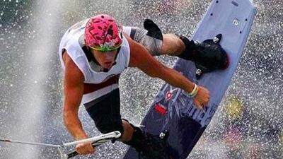 Wakeboarders perform manoeuvres such as spins and turns while being pulled across the water at around 40kph.