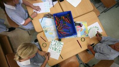 Fourth-graders from the Jumeirah English Speaking School, above, and Dubai Modern High School, below, are following Adrian Hayes's progress across Greenland and videotaping questions for the explorer.