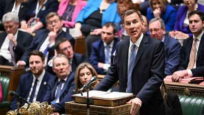 Chancellor of the Exchequer Jeremy Hunt delivers his budget to the House of Commons in London. AP