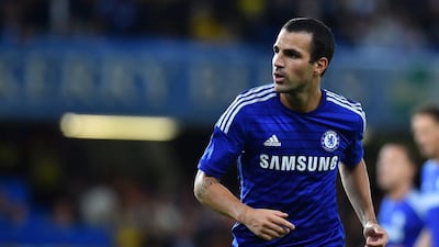 Cesc Fabregas and Chelsea top the Premier League table through four rounds of play. Ben Stansall / AFP
