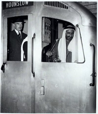 Sheikh Rashid bin Saeed, Ruler of Dubai at the time, drives a London Underground Piccadilly line train in 1959. Photo: Arabian Gulf Digital Archive