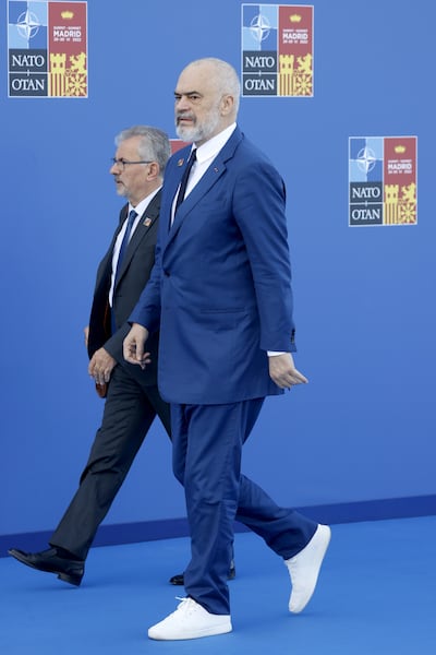 Albanian Prime Minister Edi Rama wore his signature white footwear to the NATO Summit in Spain in 2022. EPA
