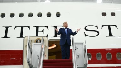 US President Donald Trump in front of a new Air Force One jet from Qatar, in a hangar at Joint Base Andrews in Maryland. AFP