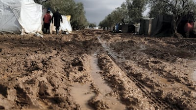 Location: Al-Karama camp in Atama. The aftermath of heavy rainfall on north Syria, residents lost their furniture, clothes and bedding as well as the tents waiting outside in open lands until the civil defense and NGs arrive to rescue them.