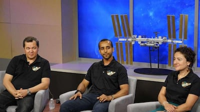 Hazza Al Mansouri, Russian roscosmonaut Oleg Skripochka and American Nasa astronaut Jessica Meir answer questions during a press conference in Houston, Texas, on Monday. Courtesy Mohammed bin Rashid Space Centre