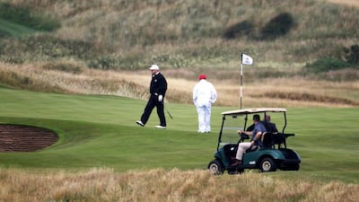 Donald Trump at Turnberry golf club Scotland. Mr Trump lost millions at his Scottish golf resorts. AP