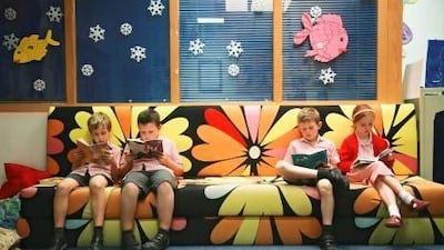 Dubai English Speaking School celebrates its 50th anniversary this week. Students enjoy a quiet read in the school library. Lee Hoagland / The National