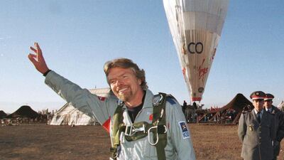 Bearded British tycoon Sir Richard Branson poses before his take off in a balloon for a third attempt at circumnavigating the world in Marrakesh, Morocco in 1998. He is currently heading for a showdown with Alaska Airlines over the Virgin name.