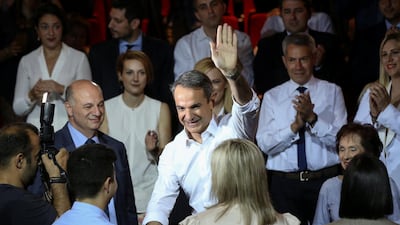 Leader of Greece's New Democracy party Kyriakos Mitsotakis waves to supporters at campaign event in Athens on June 21, 2019. Reuters