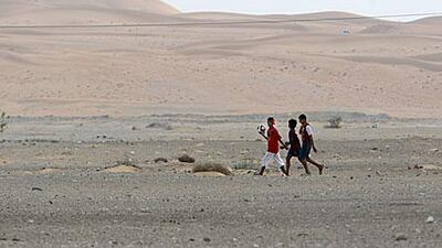 Children walking in the village of Nahel, one of several small and isolated communities in the thinly populated Eastern Region.