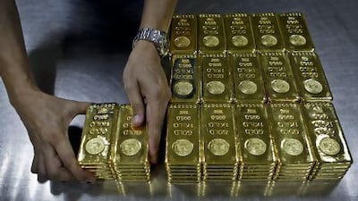 The massive increase in demand for smaller bars and coins is also responsible for the flood of new business in the Dubai gold market. Kamran Jebreili / AP Photo