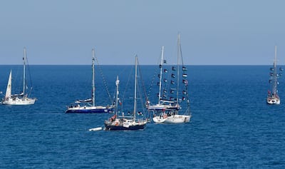 Boats participating in the Global Sumud Flotilla leave the port of Xiphonia in Sicily on Sunday. EPA