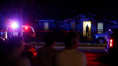 Police at the scene of a shooting at a home in Plano, north of Dallas, Texas. Vernon Bryant / The Dallas Morning News via AP
