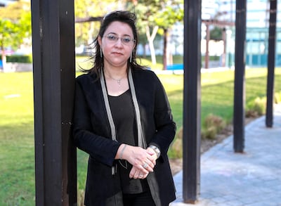 Hajer Zarrouk is one of the tutors on financial literacy programme called Ghaya, which helps Emiratis struggling with debt. Victor Besa / The National