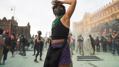 A woman gestures during a protest outside the National Palace on International Women's Day in Mexico City, Mexico. Reuters