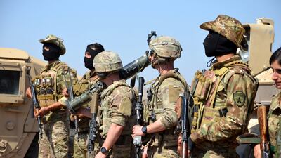 US soldiers and members of the Syrian Democratic Forces during military exercises in north-eastern Syria last year. EPA