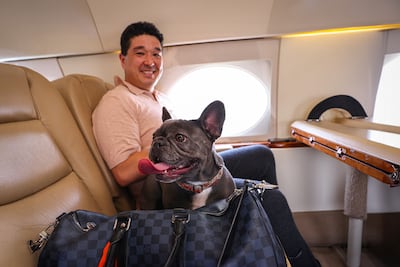 A dog and owner on board a K9 jet. Photo: K9 JETS