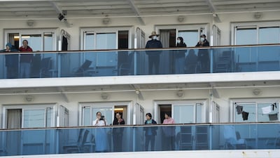 Passengers are seen on their balconies of the Diamond Princess cruise ship docked at Daikoku Pier in Yokohama, Japan. Getty Images