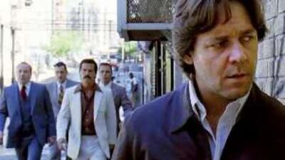 Russell Crowe plays an embattled police officer trying to track down a notorious criminal in Ridley Scott's American Gangster .