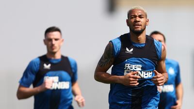 Newcastle midfielder Joelinton warms up in Dubai.