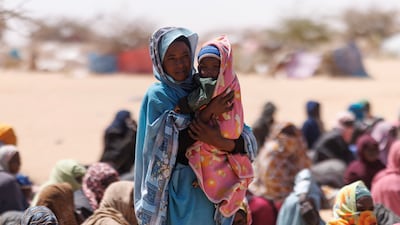 Sudanese refugees queue for food at a camp in Oure Cassoni, Chad. Getty Images