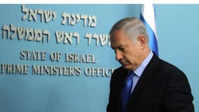 Israel's prime minister Benjamin Netanyahu leaves the podium as he completes a statement in his Jerusalem offices on Thursday, July 1, 2010.
