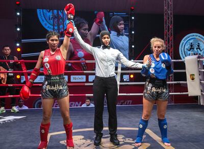 Emirati referee Nora Saeed, centre, at the IFMA Asian Championship. Ruel Pableo for The National