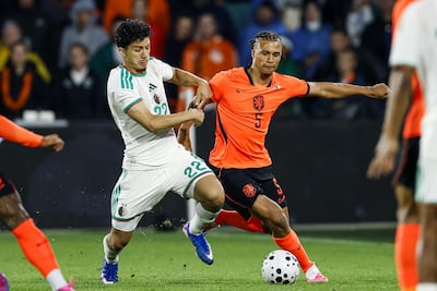 Algeria's Ibrahim Maza, left, battles for possession with Nathan Ake during their World Cup 2026 warm-up match. EPA