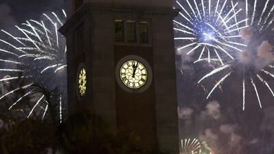 Hong Kong welcomes 2015 with fireworks behind the Clock Tower in Tsim Sha Tsui, Hong Kong, China, 31 December 2014. Jerome Favre/EPA