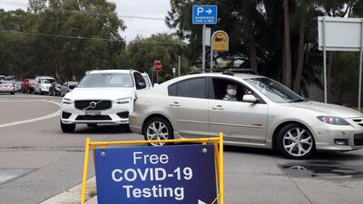 Residents of the northern beaches queue up for Covid-19 tests at a roadside testing centre in Sydney on December 20, 2020. AFP