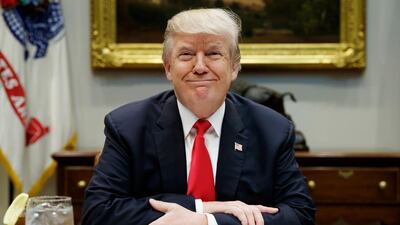 President Donald Trump smiles as he speaks before hosting a lunch with Senate Republicans in the Roosevelt Room of the White House, Tuesday, Dec. 5, 2017, in Washington. (AP Photo/Evan Vucci)