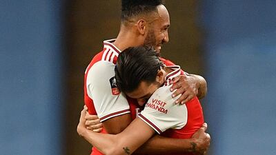 Pierre-Emerick Aubameyang and Dani Ceballos celebrate after the match. Reuters
