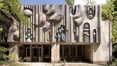 Soviet art relief decorates the entrance to a former cinema within the exclusion zone in Pripyat. Bloomberg
