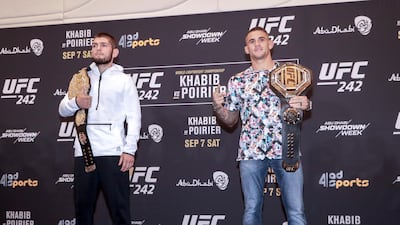Khabib Nurmagomedov and Dustin Poirier on stage during the media day for UFC 242. Victor Besa / The National